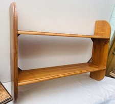 Vintage wall-mounted pine shelf unit