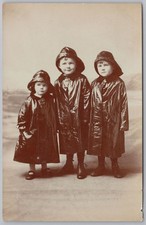 Children Dressed in Oilskins & Sou'wester Hats RP Postcard