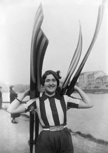Woman carries paddles winter - woman,