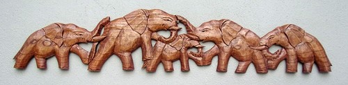 Hand carved elephant family - hand,