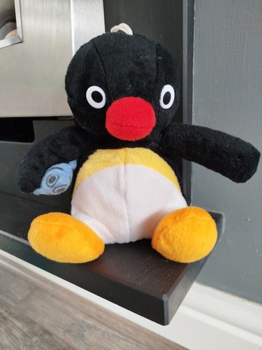Pingu plush toy holding - pingu,