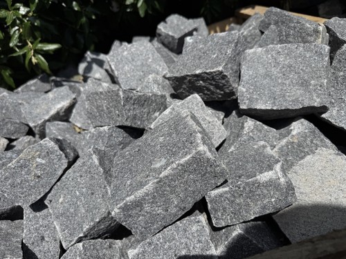 Black granite sets paving