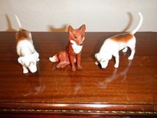 Beswick Seated fox 1748 & Two