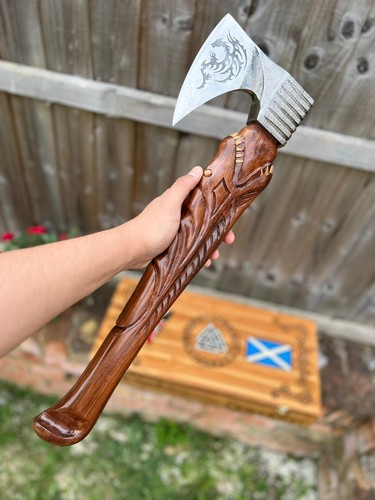 Hand carved wood handle axe - hand,