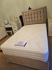 Brand new 4 foot divan bed with cashmere covered mattress and padded headboard