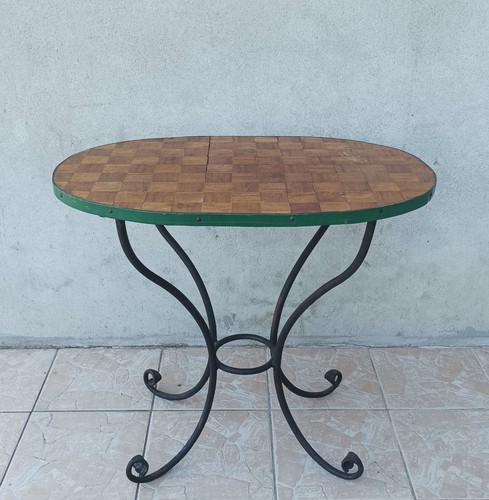 Wrought iron and walnut - iron,