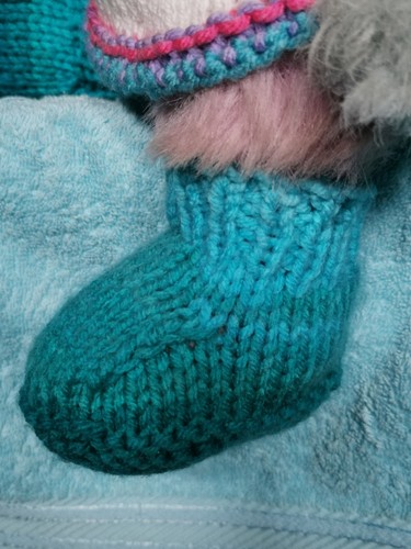 Hand knitted teddy bear - hand,