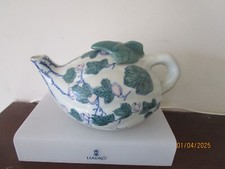 Teapot with Ornate Leaf Lid