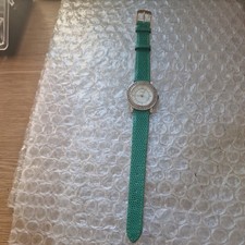 ROUND SUZY B  GREEN CRYSTAL & GREEN RUBBER STRAP WATCH