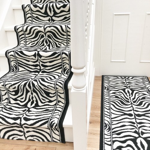 Long zebra print stair carpet - zebra,