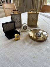 4 clocks and a Barometer