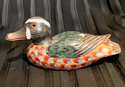 Hand carved and painted - hand,