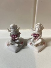 Pair of Resin Cherubs sitting