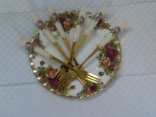 6  cake Forks  Gold colour