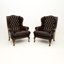 Pair of Antique Leather Wing Back Armchairs