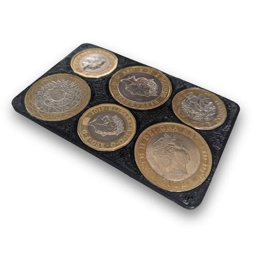 Coin holder 9 - £1,