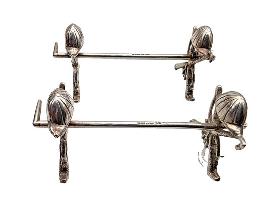 Unusual pair sterling - unusual, of