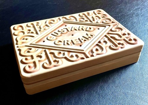 Custard cream shaped biscuit - custard,