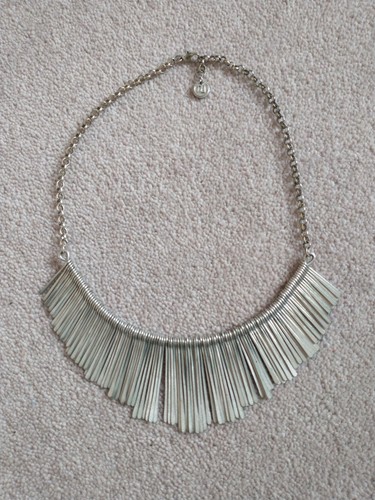 Unusual statement silver - unusual,