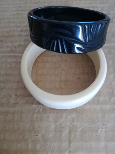 Two plastic bangles - plastic, cream