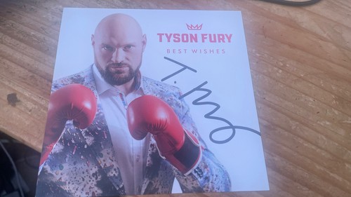 World champ tyson fury signed - world,