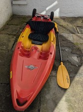 Sit On Canoe with Paddle