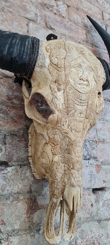 Hand carved buffalo - hand,