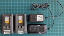 2 x Flymo genuine ACCU C-Li 20V batteries + one charger, good working condition