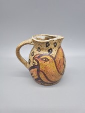 A Vintage Peter Arnold For Alderney Studio Pottery Milk Jug With Bird Motif.