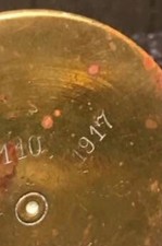 This Brass WW1 Trench Art Ashtray is a remarkable historical artifact crafted 