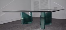 Large clear/green square glass coffee table with bevelled edge