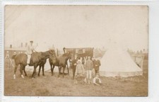 Faded picture postcard of a gypsy encampment (C83517)