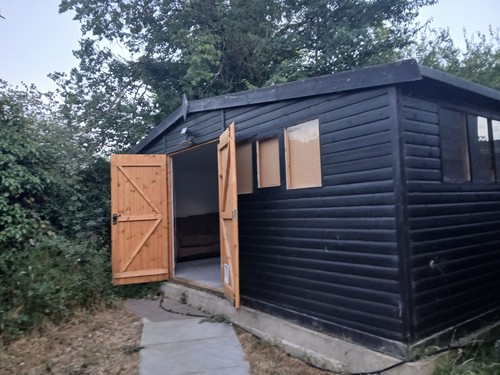 Insulated boarded shed used - insulated,