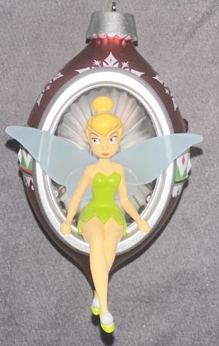 Tinker bell trimming the - bell, tree