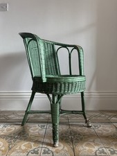 An Early 20th Century French Green Painted Conservatory Wicker Armchair C1920-30