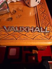 VAUXHALL BLACK & SILVER CAPITALS CAR BADGE 
