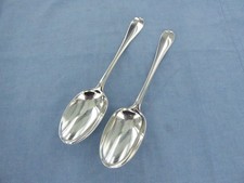 AN ANTIQUE PAIR OF STERLING