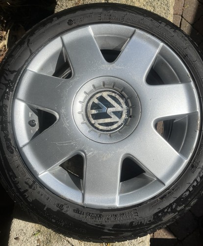 Polo rim and new tyre - and,