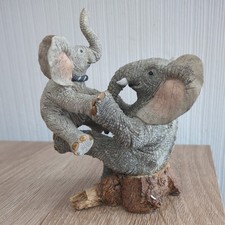 PAW PRINTS TUSKERS ELEPHANT