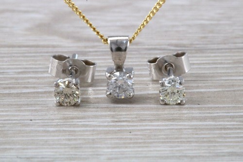 Solitaire stud earrings with - solitaire,