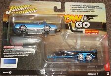 1980 CHEVY MONTE CARLO & BOAT TRAILER  - 1:64 - JOHNNY LIGHTNING -MINT/CARDED