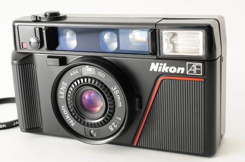 Warranty nikon l35 af - yr,