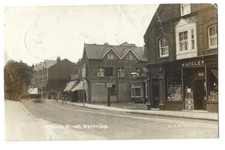Real photo postcard of Church street  Weybridge in Surrey in average condition