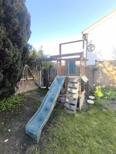 Climbing frame with slide And