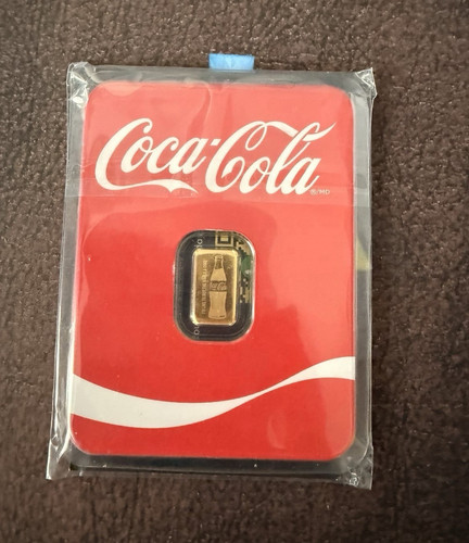 Coca cola gram - gram, gold