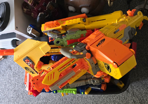 Lots nerf guns some - of,