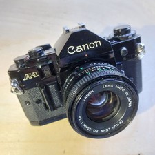 Canon A-1 SLR Film Camera with Canon FD 50mm F/1.8  Lens