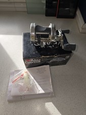 ABU Ambassadeur 6501 S  Silver Multiplier (Left Hand Wind) with Power Pro Braid