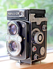 Yashica 24 TLR. Probably the best anywhere. Still boxed. Stunning condition.