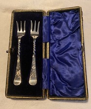 Cased Pair Of Antique Silver